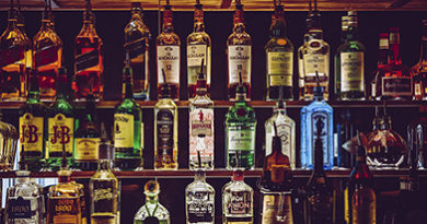 liquor-shelf-many-bottles