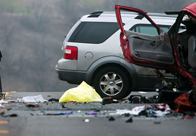 car-crash-officer-near-debris