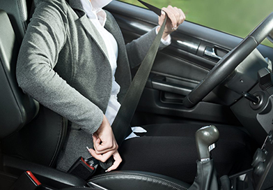 woman-buckles-up-drivers-seat